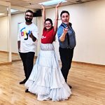 wedding dance couple and their instructor